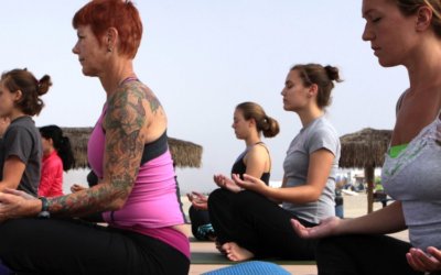 Woman Reluctantly Moves Her Yoga Mat Over To Make Room For Someone Else