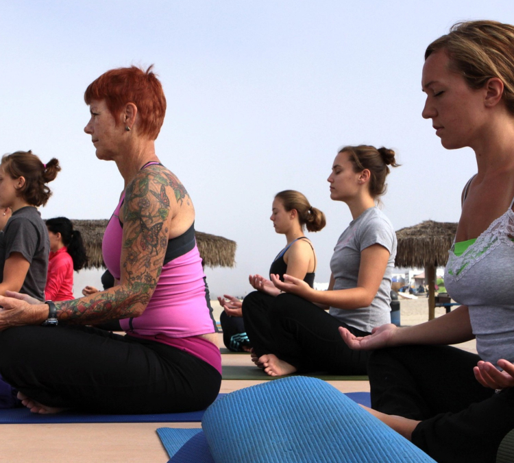 Woman Reluctantly Moves Her Yoga Mat Over To Make Room For Someone Else